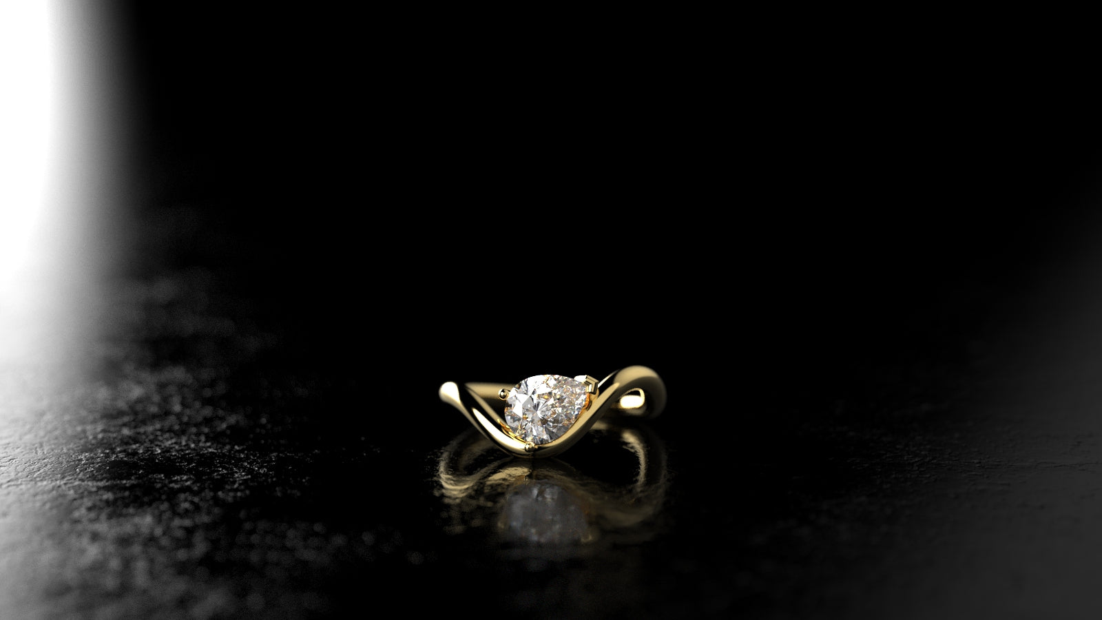Gold ring with a diamond on a black background